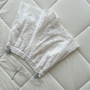 White beach shorts